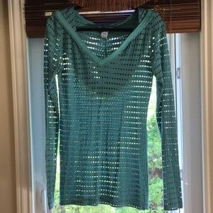 Green hoody with holes (see through).